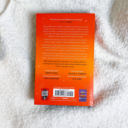 Book cover with text on a textured white surface