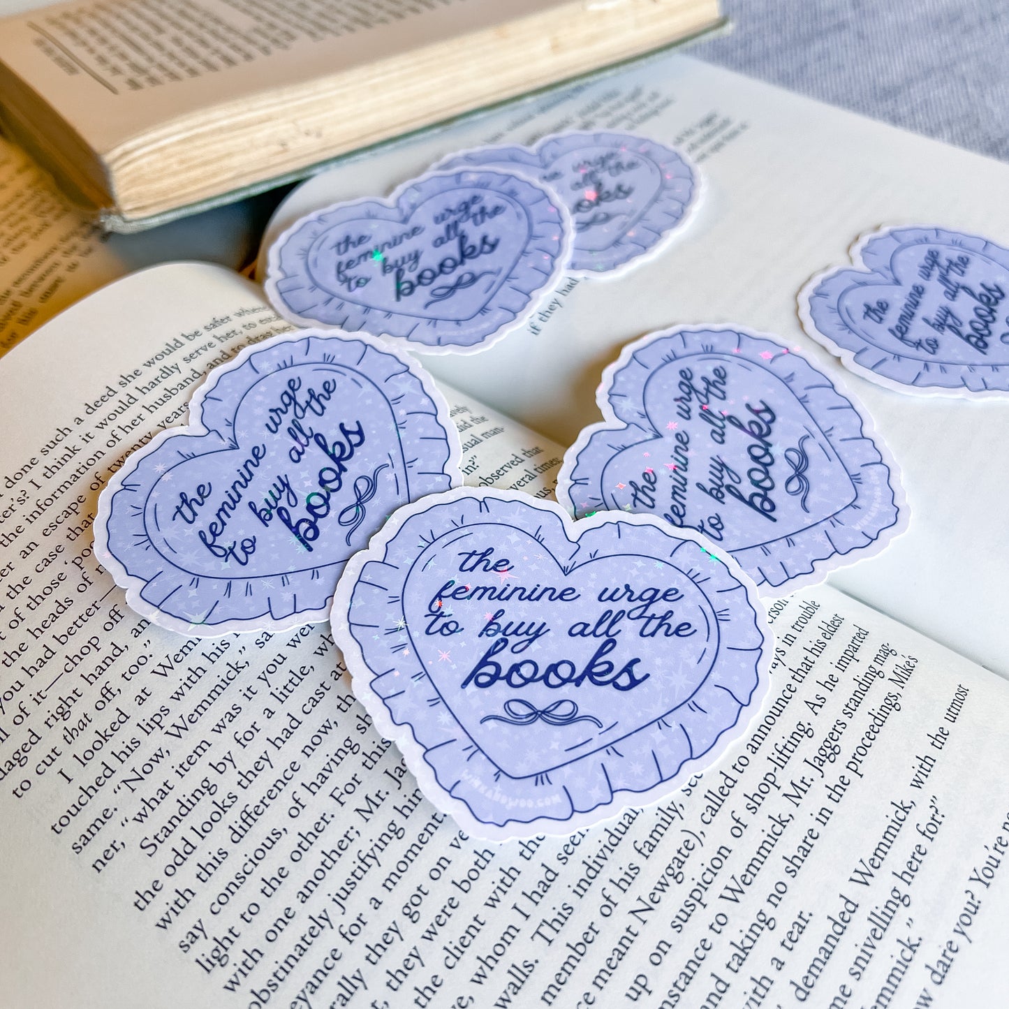 Blue circular stickers with text on an open book