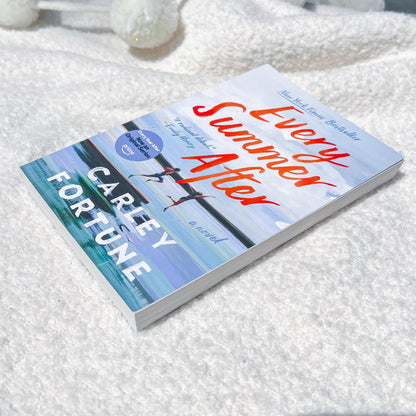 Book titled 'Every Summer After' by Carley Fortune on a textured white surface