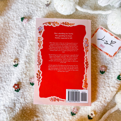 Book back cover with decorative elements on a textured surface