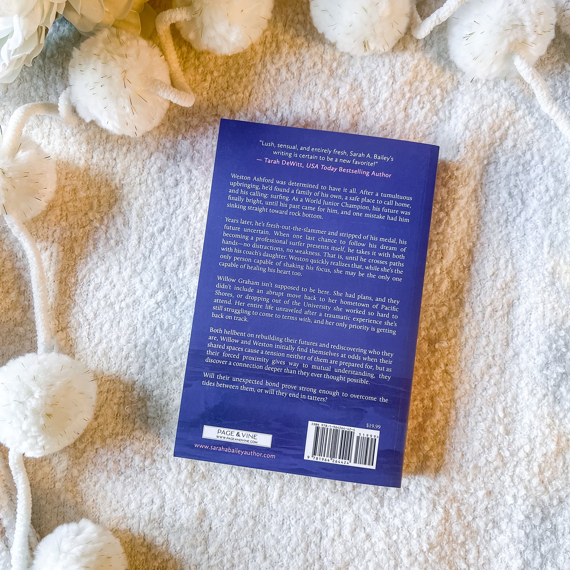 The back of the book "tattered tides" by Sarah A. Bailey