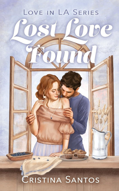 Book cover of 'Lost Love Found' featuring a couple embracing in a kitchen.