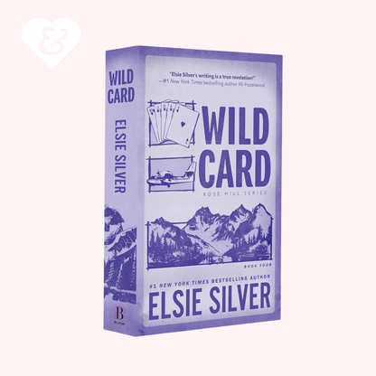 Book cover of 'Wild Card' by Elsie Silver with purple design and mountain illustration on a white background