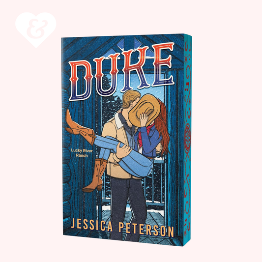 Book cover of 'Duke' by Jessica Peterson with a couple embracing in a forest.