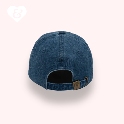 Blue denim cap on a white background