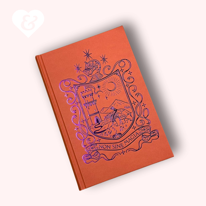 Orange book with purple crest design on a white background