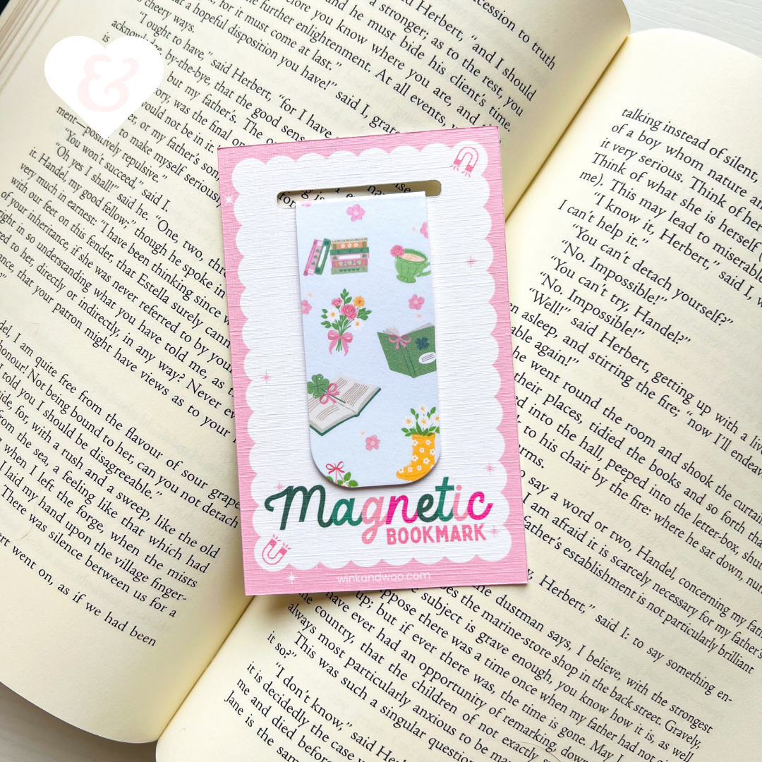 Magnetic bookmark with cartoon design on an open book