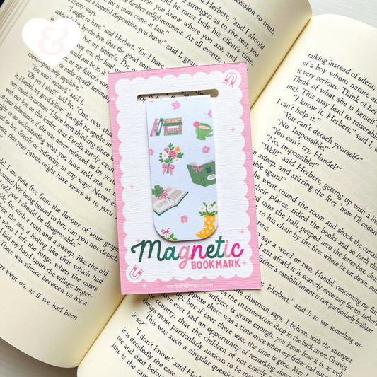 Magnetic bookmark with cartoon design on an open book