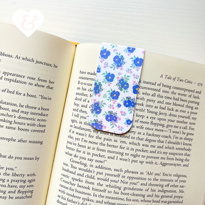 Floral bookmark on an open book with text