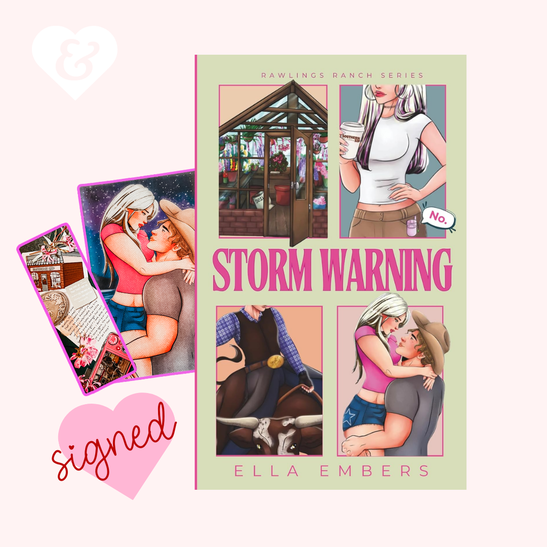 Book titled 'Storm Warning' by Ella Embers with a bookmark and heart-shaped sign.