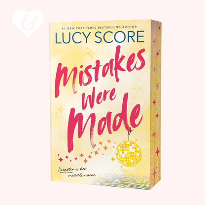 Book cover of 'Mistakes Were Made' by Lucy Score with a disco ball on a yellow background