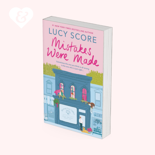 Book titled 'Mistakes Were Made' by Lucy Score with a colorful cover design on a white background