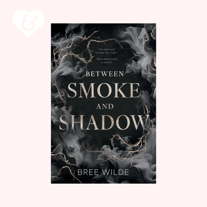The book "between smoke and shadow" by bree wilde with a smoky black design