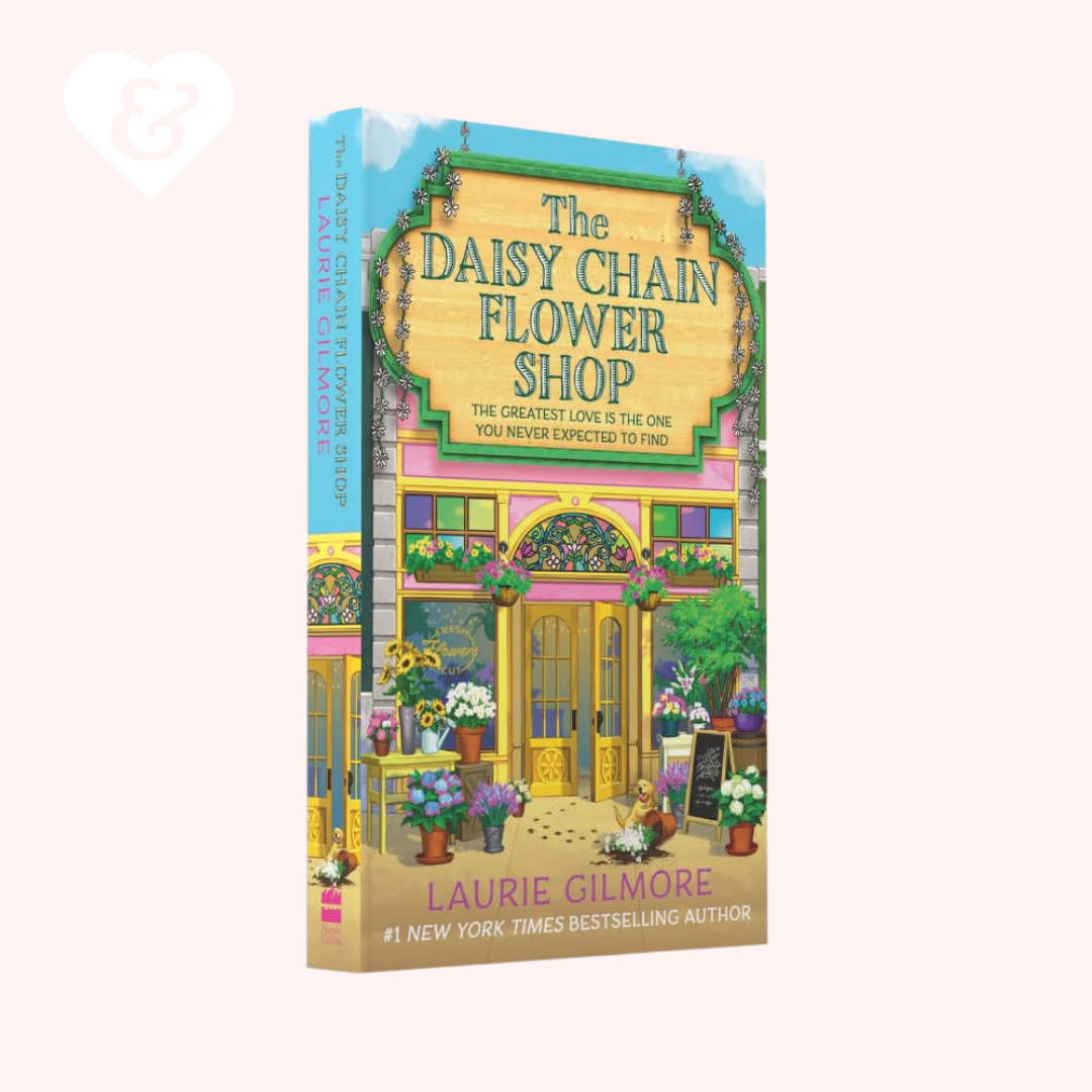 Book cover of 'The Daisy Chain Flower Shop' by Laurie Gilmore with a colorful illustration of a flower shop.