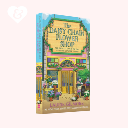 Book cover of 'The Daisy Chain Flower Shop' by Laurie Gilmore with a colorful illustration of a flower shop.
