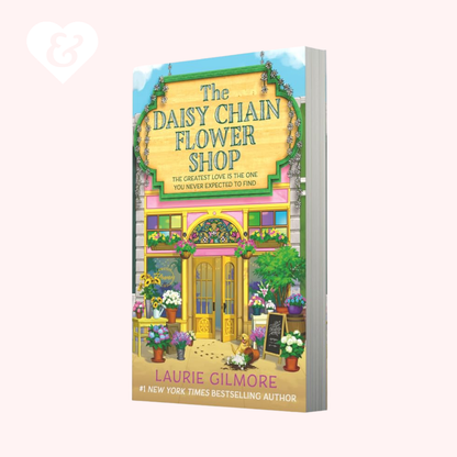 Book cover of 'The Daisy Chain Flower Shop' by Laurie Gilmore with a colorful flower shop illustration.