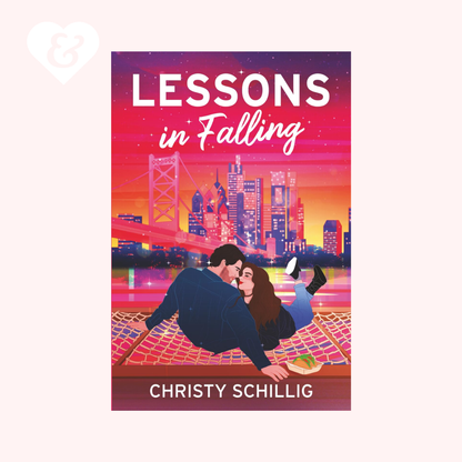 Book cover of 'Lessons in Falling' by Christy Schillig with a couple on a blanket in a cityscape.