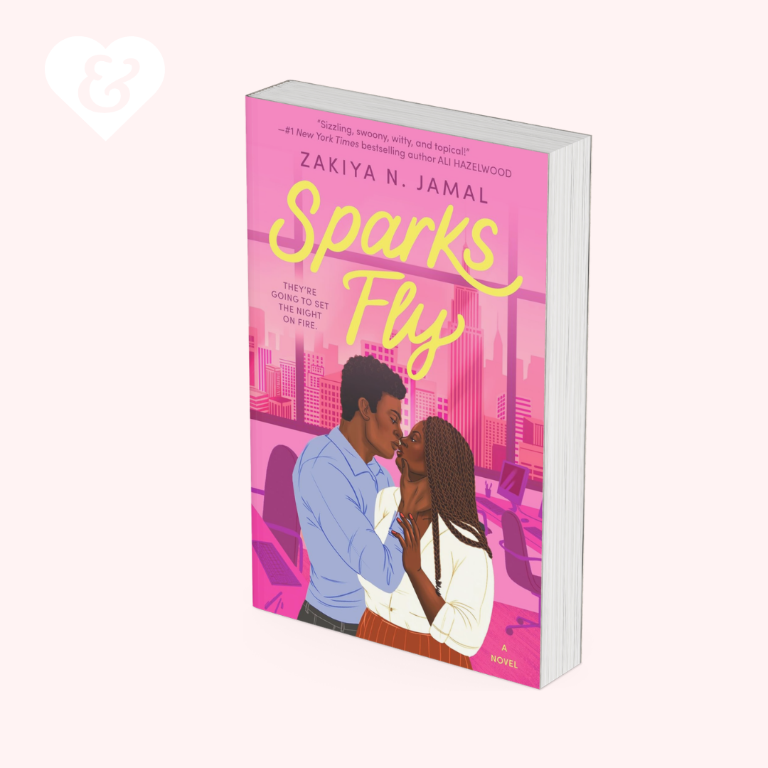 "Sparks fly" book by Zakiya N Jamal, which shows a couple embracing, on a pink background