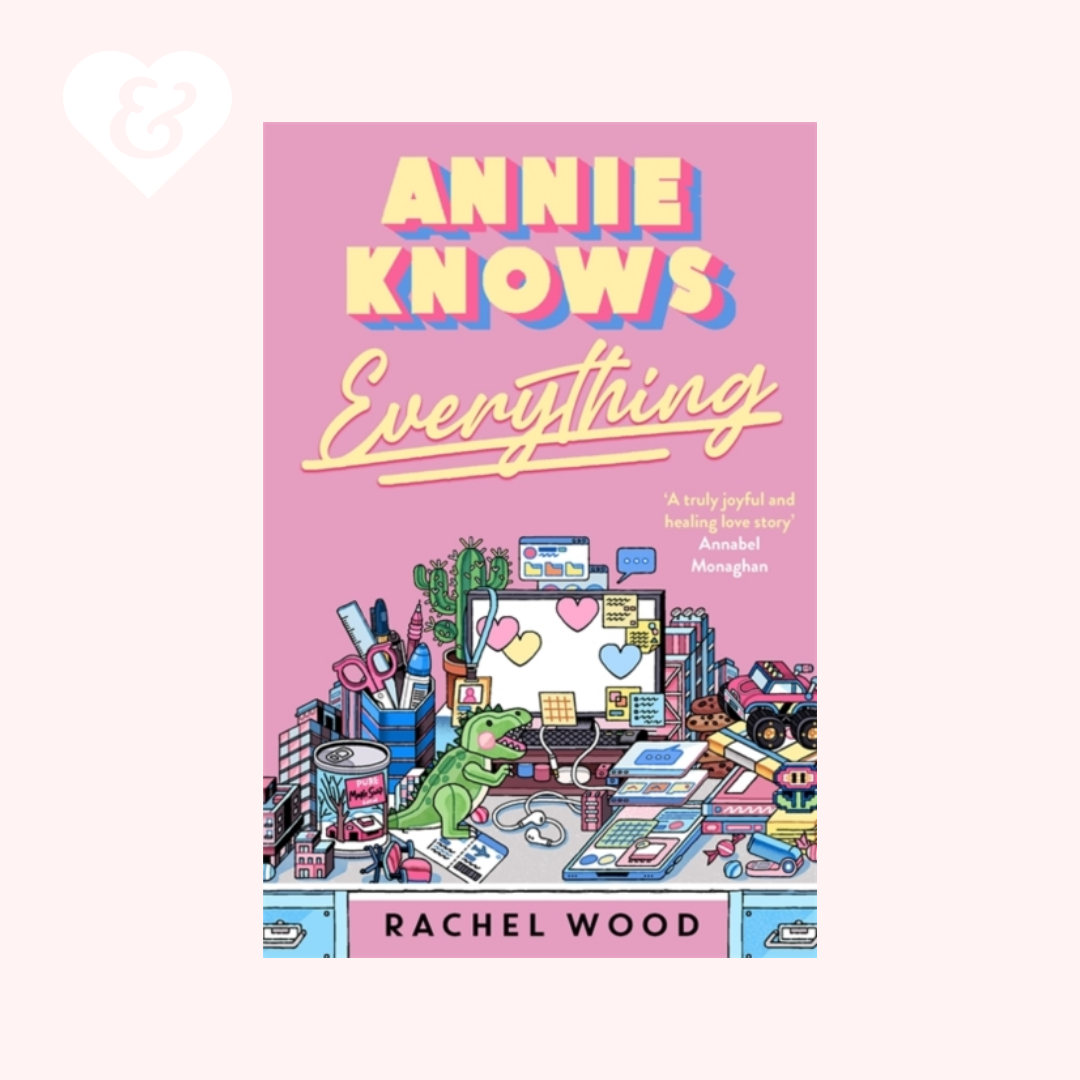 Book cover of 'Annie Knows Everything' by Rachel Wood with a pink background and colorful illustration.
