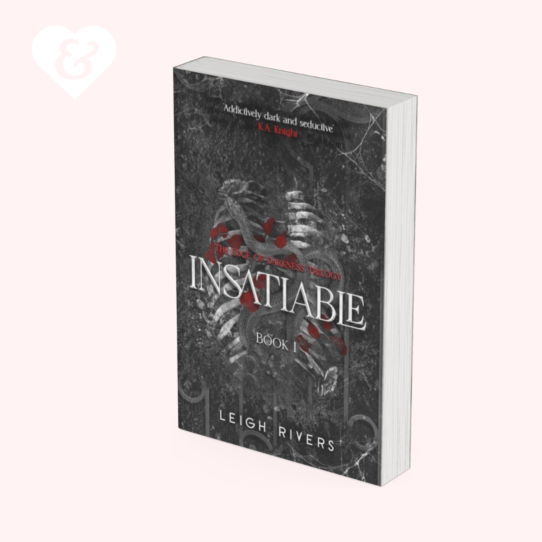 Book titled 'Insatiable' by Leigh Rivers on a white background