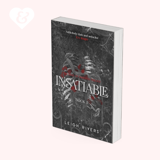 Book titled 'Insatiable' by Leigh Rivers on a white background