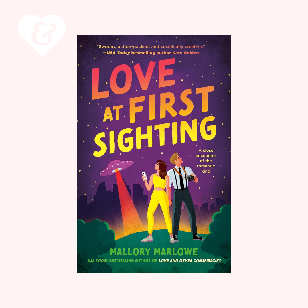 Book cover of 'Love at First Sighting' with a couple and UFO illustration.