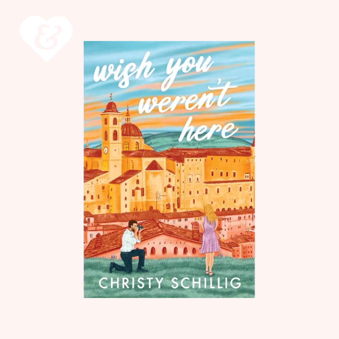 Book cover of 'Wish You Weren't Here' by Christy Schillig with a scenic illustration and couple on a hilltop.