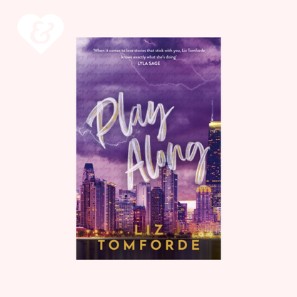 Book cover of 'Play Along' by Liz Tomforde with a city skyline and purple sky.