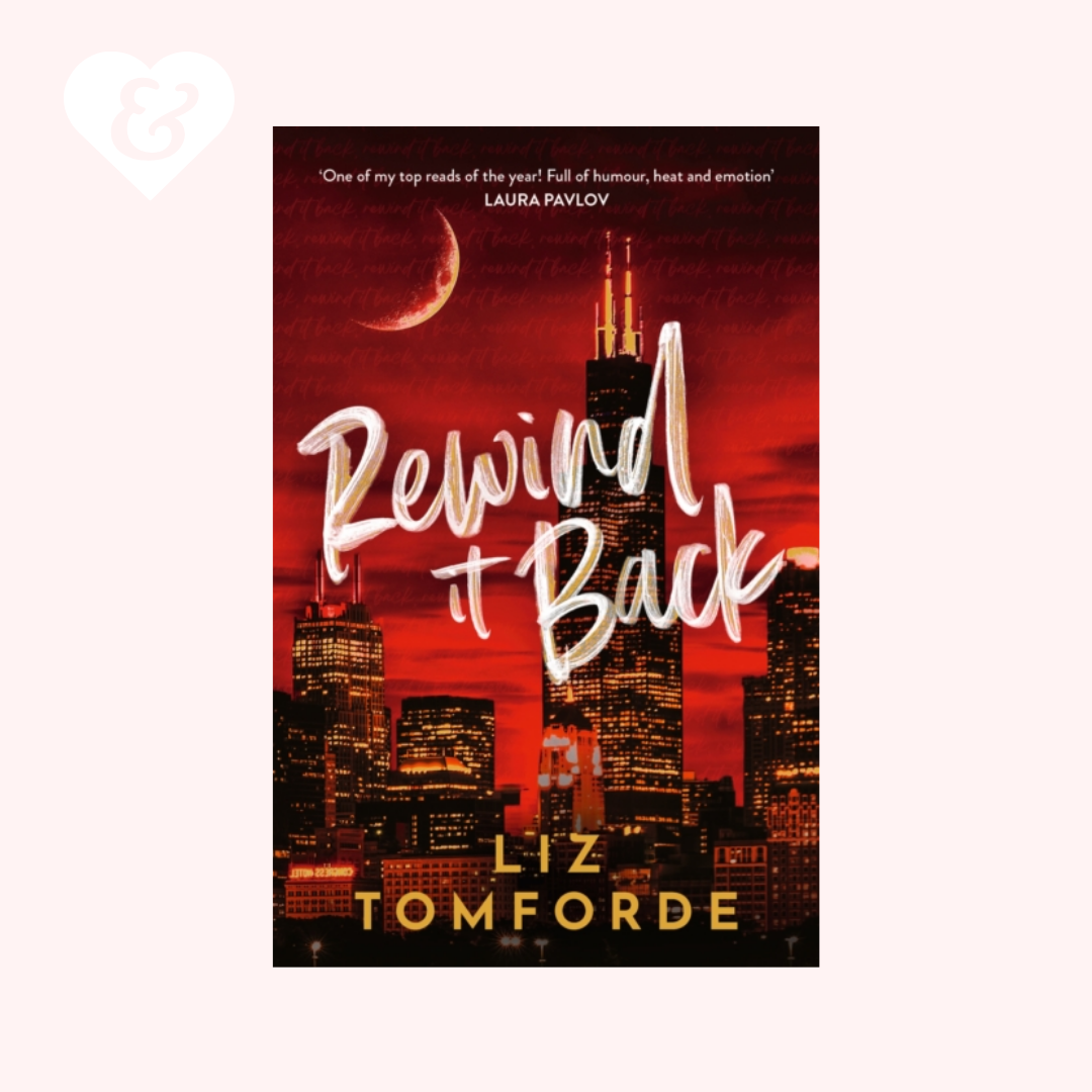 Book cover of 'Rewind It Back' by Liz Tomforde with a city skyline and moon in the background.