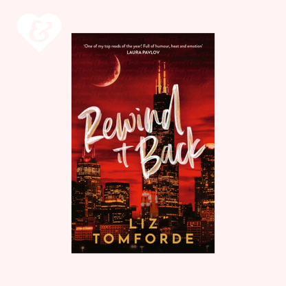 Book cover of 'Rewind It Back' by Liz Tomforde with a city skyline and moon in the background.