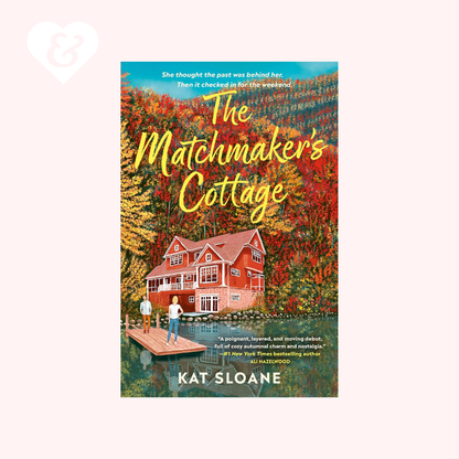 Book cover of 'The Matchmaker's Cottage' by Kat Sloane with a scenic illustration of a house and people on a dock.