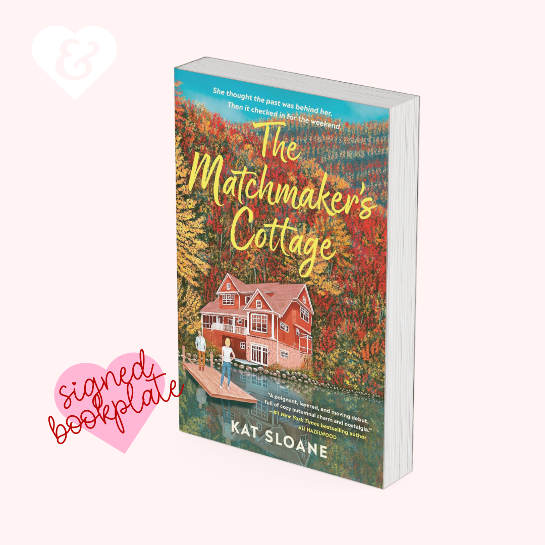 Book titled 'The Matchmaker's Cottage' by Kat Sloane with a colorful cover featuring a house and trees.