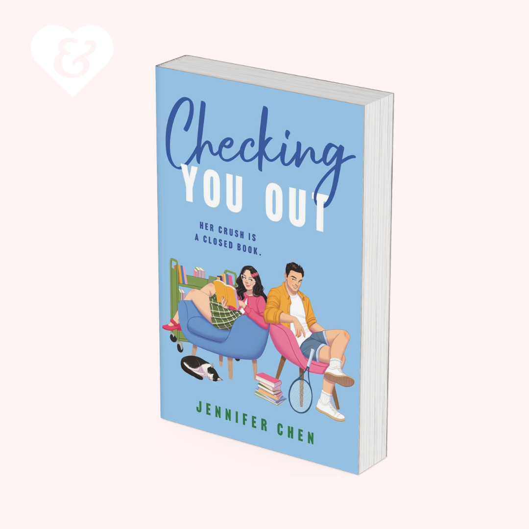 A 3D mockup of the book 'Checking You Out' by Jennifer Chen, featuring a light blue cover with an illustration of a couple and a woman in a wheelchair. The book is shown at an angle on a pale pink background with a white heart logo in the top-left corner.