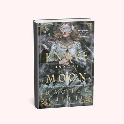 The Knave and the Moon book by Rachel Gillig, featuring a dark gray cover with gold lettering and an illustration of a blindfolded girl in a white dress, shown on a light pink background.