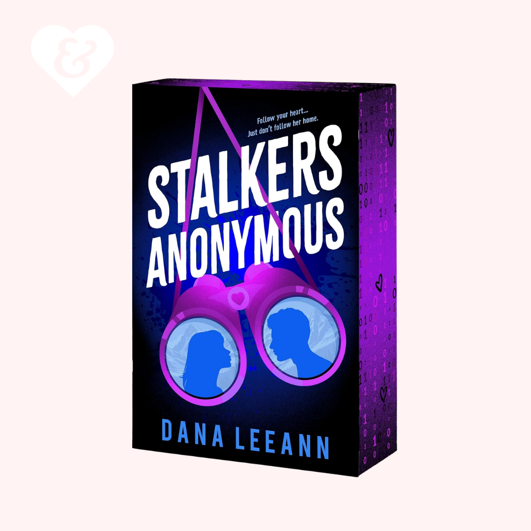 Book cover for 'Stalkers Anonymous' by Dana Leeann, featuring a dark blue and purple design with a pair of binoculars and silhouettes inside the lenses, shown on a pale pink background.