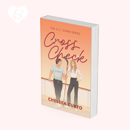 A 3D mockup of a paperback book titled 'Cross Check' by Chelsea Curto, showing the front cover and a slight page curl on the right side. The cover features an illustration of a man and a woman in a dance studio with a peach-to-orange gradient background.