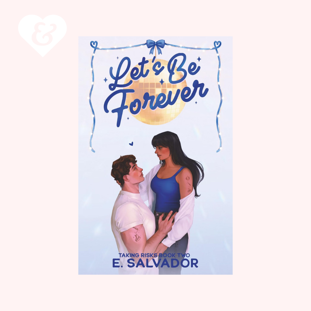 Book cover for 'Let's Be Forever' by E. Salvador, featuring an illustration of a man and woman embracing under a disco ball, centered on a pale pink background with a small white heart logo in the top-left corner.