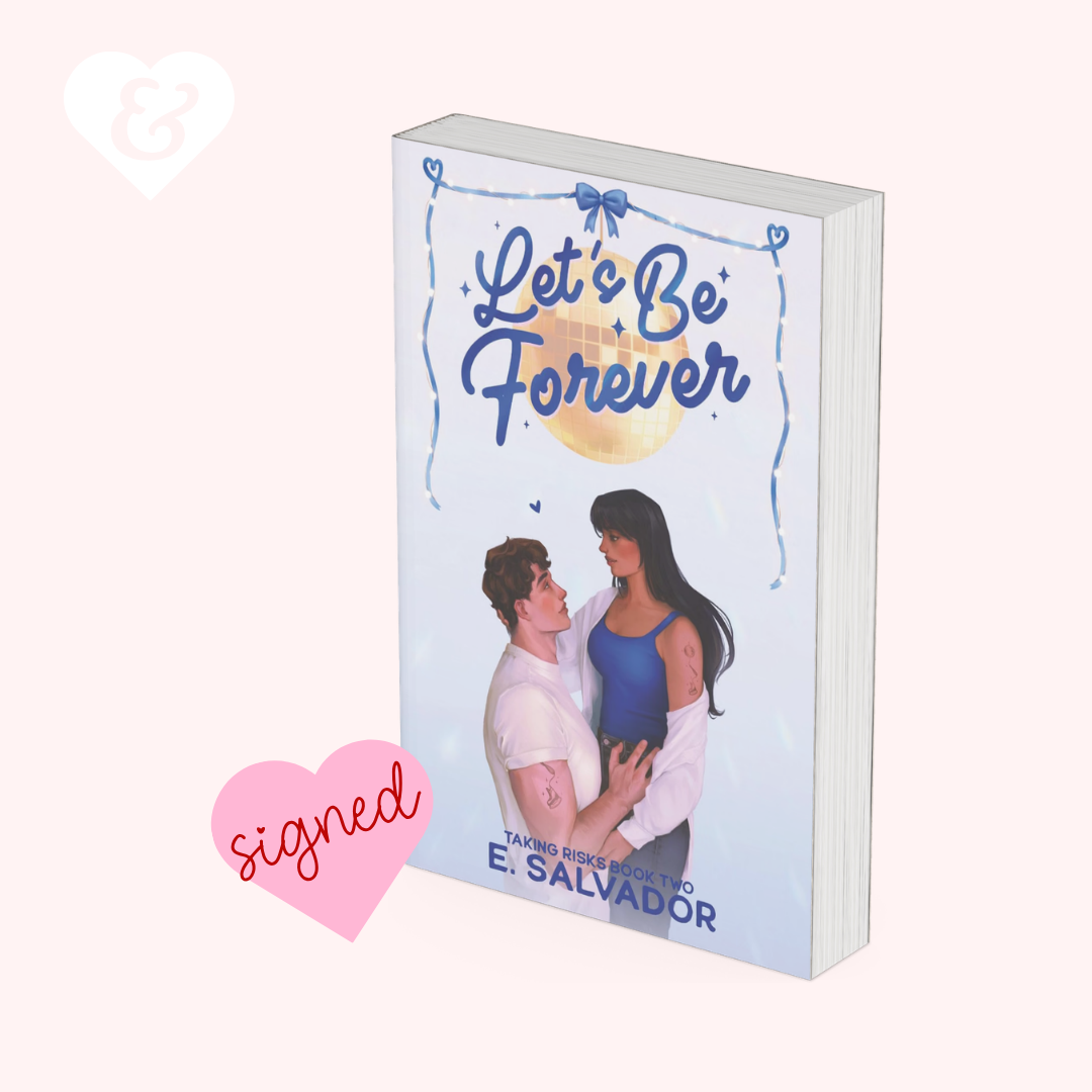 A 3D mockup of a paperback book titled 'Let's Be Forever' by E. Salvador, featuring a light blue cover with a couple on the front.