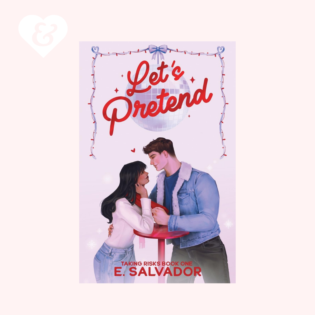 Book cover for 'Let's Pretend' by E. Salvador, featuring an illustration of a couple embracing at a small red table under a disco ball and string lights, set against a pale pink background with a white heart-shaped logo in the top left corner.