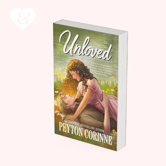 A book cover for the novel 'Unloved' by Peyton Corinne, featuring an illustration of a woman in a pink dress kneeling in a field and comforting a young girl. The book is shown at an angle against a pale pink background with a faint white heart logo in the upper left corner.
