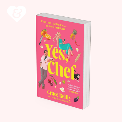 The book cover of 'Yes, Chef' by Grace Reilly, displayed as a 3D mockup on a pale pink background. The cover features a vibrant pink background with whimsical illustrations of food items (pineapple, chili pepper, olives), a woman in a teal dress, and a man in a white shirt, with the title in large yellow text.