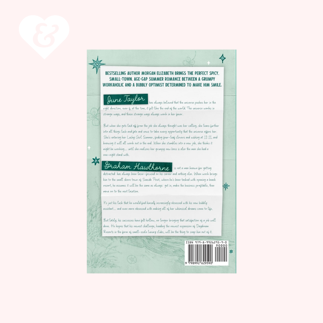 The back cover of a book shown against a pale pink background. The cover is light green with dark green text blocks, decorative snowflake accents, and a barcode at the bottom right.