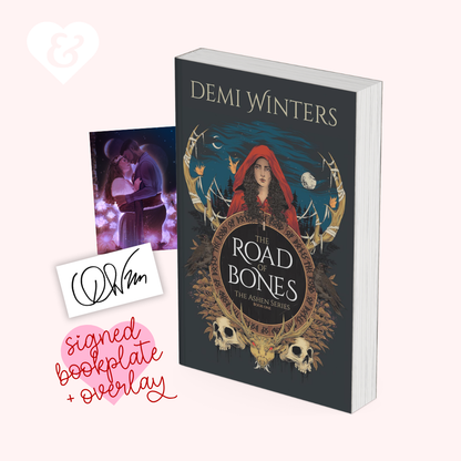 Book titled 'The Road of Bones' by Demi Winters with a signed bookplate overlay on a white background