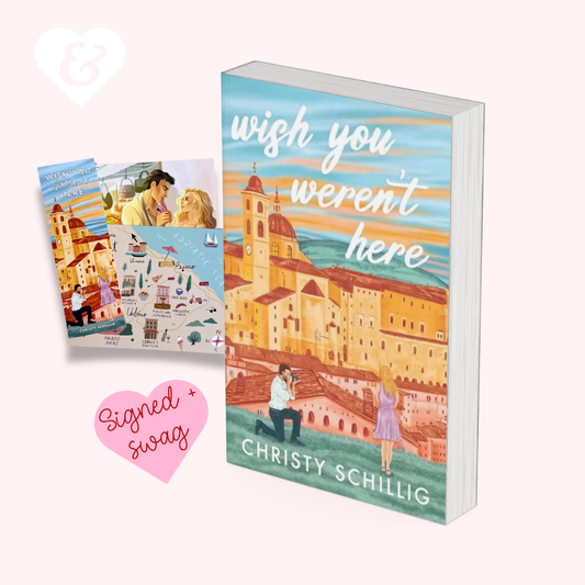 Book titled 'Wish You Werent Here' by Christy Schilling with a signed swag heart on a white background