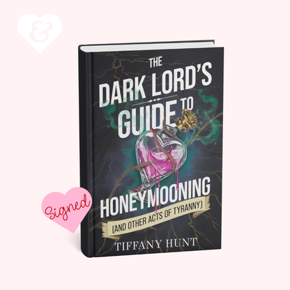A signed copy of the book 'The Dark Lord's Guide to Honeymooning' by Tiffany Hunt, displayed on a light pink background 