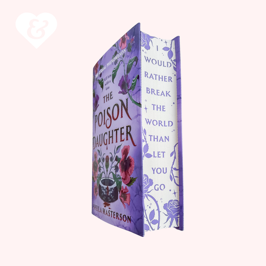 The Poison Daughter book by Amelia Masterson, shown standing upright at an angle to display both the front cover and the inner page block. The cover features a lavender background decorated with purple flowers, red roses, and green leaves, with the title in dark red lettering.