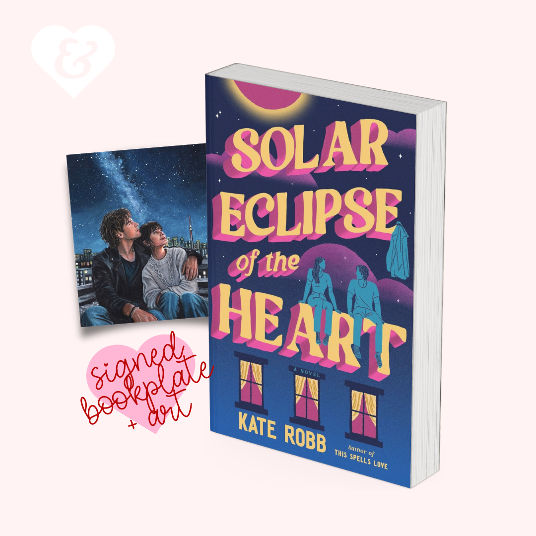 Book cover for 'Solar Eclipse of the Heart' by Kate Robb, shown upright next to a small printed bookplate with a photo of two people under a starry sky. A pink heart-shaped badge with 'signed bookplate + art' text appears on a pale pink background.