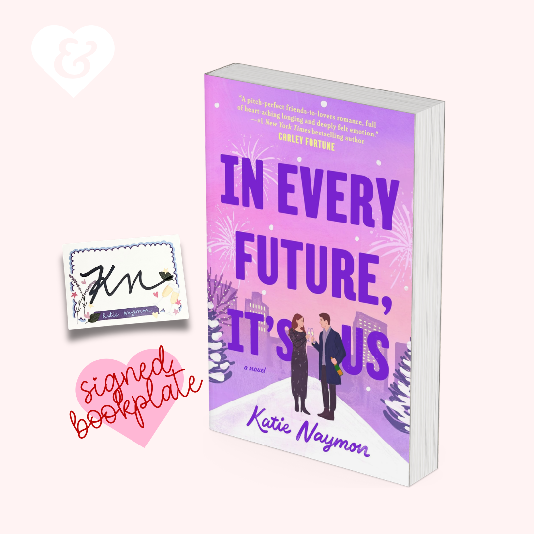 Book cover mockup for the novel "In Every Future, It's Us" by Katie Naymon, shown upright with a small signed bookplate and a decorative card on a pale pink background.