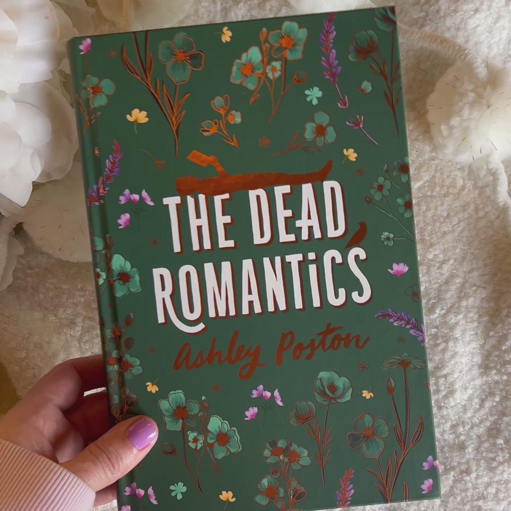 Video showing close up "the dead romantics" book