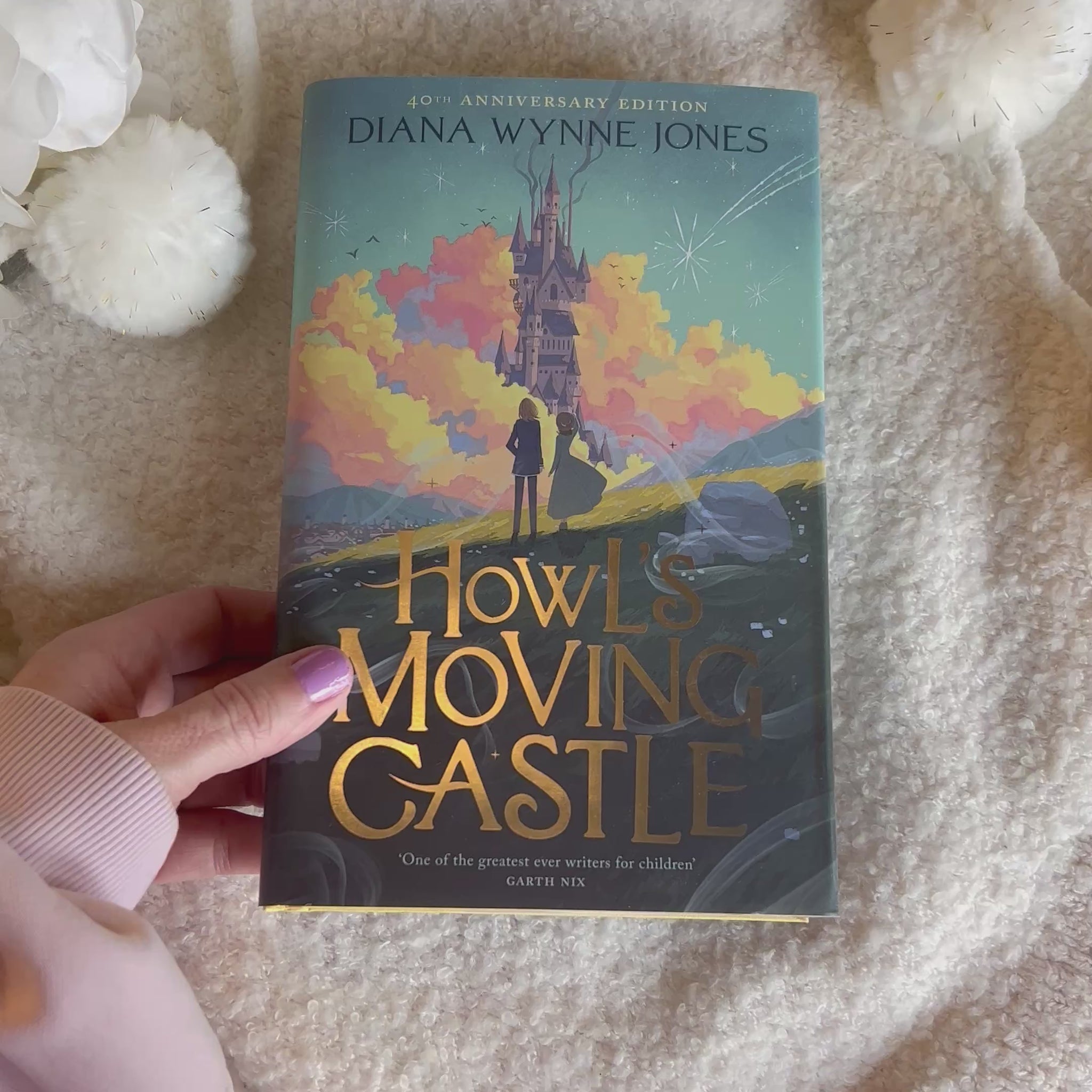Close ups of the "howl's moving castle" book
